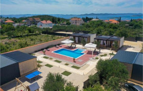 Awesome home in Drage with Outdoor swimming pool, WiFi and 12 Bedrooms